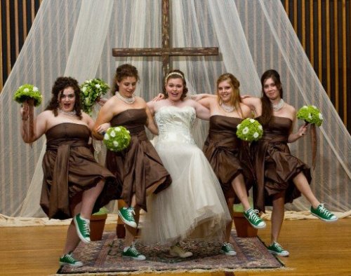Another fabulous image courtesy of OnceWed A bride with green in her dress