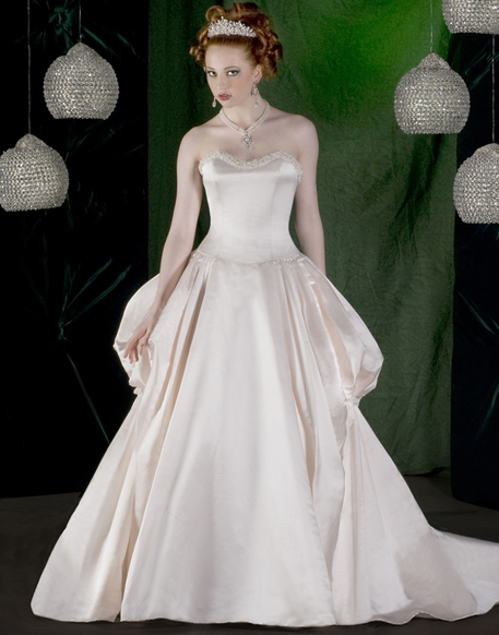 Strapless wedding gown with saddlebags built in