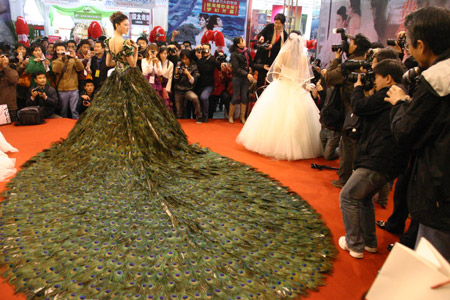  feather wedding gowns are rare beasts indeed at least in real life