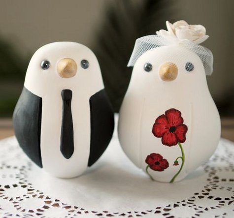  can choose from a range of prefab or custom birdy wedding cake toppers