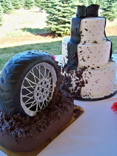 Grooms cake shaped like tire in chocolate mud.